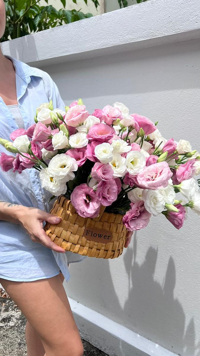 A basket of pink and white lisianthus — a tender arrangement by YUCCA Flowers in Antalya